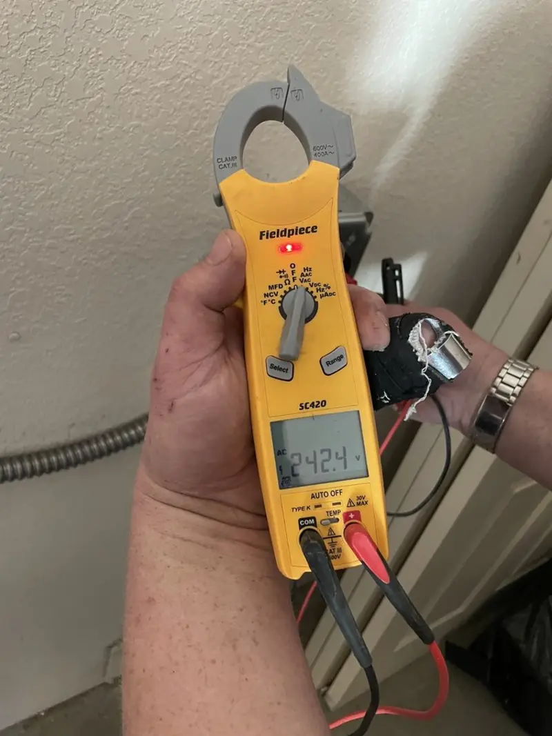 Voltage testing with clamp meter during Electrical Installation Services in Daphne